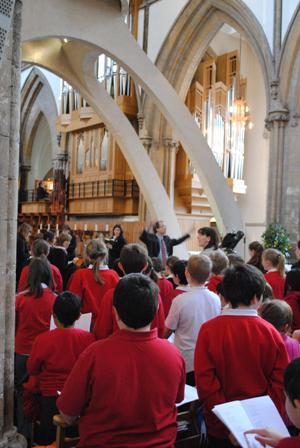 Girl choristers joined by 450 primary school pupils at Llandaff Cathedral