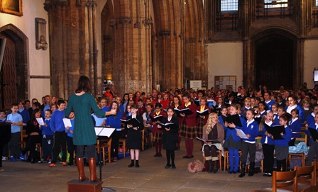 Choral Scholars sing carols with more than 700 children